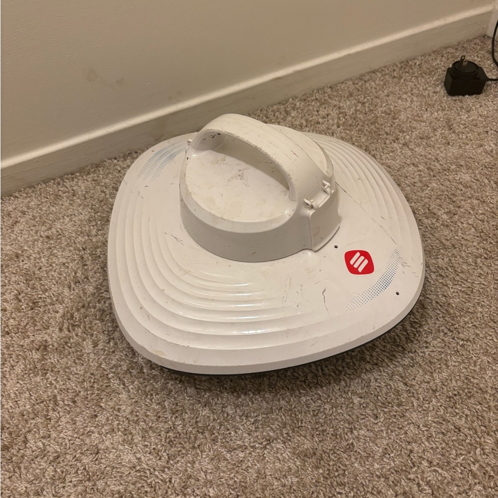 White Robotic pool vacuum